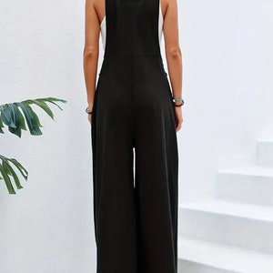 Long sleeveless overalls jumpsuit in Boho style, loose and casual, with pockets, women's clothing. image 9