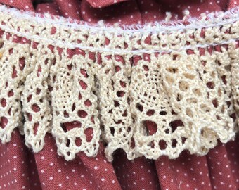 Rose polka dot ruffled trim with ecru crocheted lace