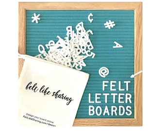 May include: A teal felt letter board with a wooden frame, scattered white letters, and a canvas bag that says "felt like sharing." The words "FELT LETTER BOARDS" are displayed on the board.