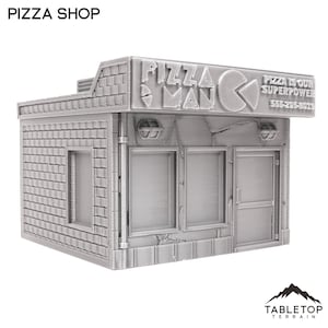 Puede incluir: Un edificio gris de ladrillo con un letrero que dice "Pizza Man" y un logotipo de Pac-Man. El letrero también incluye el texto "Pizza is our superpower" y un número de teléfono. El edificio tiene dos ventanas y una puerta.