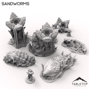 Pode incluir: Um conjunto de seis miniaturas de minhocas de areia cinzas para jogos de mesa. As minhocas de areia estão em várias poses, incluindo uma minhoca de areia com a boca aberta e uma minhoca de areia com a cauda levantada. As miniaturas são feitas de um material plástico durável e são perfeitas para adicionar um toque de realismo aos seus jogos.