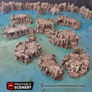 May include: A set of 3D printed, detailed, rocky islands with bridges connecting them. The islands are painted in a brown and grey colour scheme, and the water is a light blue colour. The islands are designed for use in tabletop games and role-playing games.