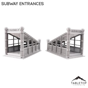 Puede incluir: Dos entradas de metro de plástico gris con la palabra "SUBWAY" impresa en la parte delantera de cada entrada.