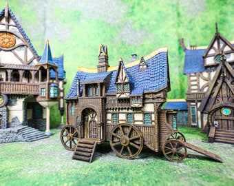 May include: A miniature wooden model of a house on wheels with blue and brown details. The house has a pointed roof, windows, and a door. The wheels are large and wooden. The house is sitting on a green grassy surface.