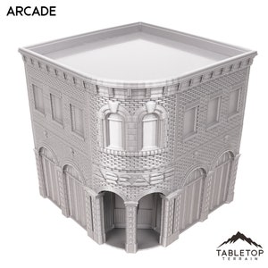 以下が含まれることがあります： 「ARCADE」と書かれた看板のある、灰色のレンガ造りの建物。建物は平らな屋根を持ち、両側に2つの窓とアーチ型の入り口があります。建物はミニチュアモデルです。