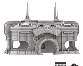 May include: A gray, detailed model of a futuristic building with a large archway entrance. The building has a sign that reads "CANTINA" and features intricate details like pipes and vents.