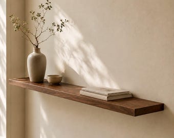 Estantería flotante de pared de nogal – tablero de pared de madera maciza con fijación invisible.