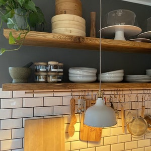 Floating solid wood wall shelf made of oak wood