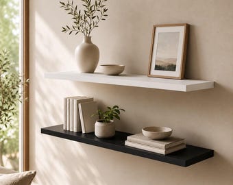 Floating wall shelf in black or white – custom-made wall board with invisible mounting.