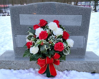 This Christmas Memorial Cemetery Cone has red and white ruffled rose blooms with variegated holly and white baby's breath.