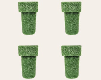 This is a set of 4 floral foam vase inserts for cemetery arrangements.