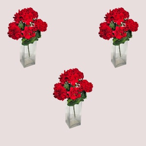 This realistic artificial flower is 3 red geranium bushes with Greenery.  It is a UV Resistant floral craft supply.