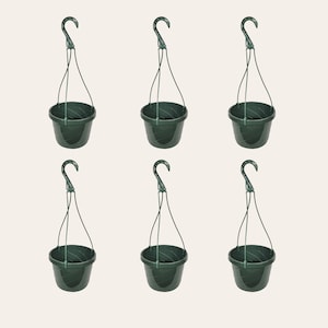 May include: Six dark green hanging plant baskets with attached metal hooks. The baskets are round with a ridged design and are suspended by wire hangers. Ideal for displaying flowers or plants.
