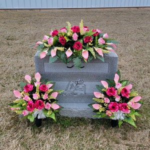 This headstone saddle and cemetery cone set has silk grave flowers including Beauty Pink Calla Lilies and Roses.