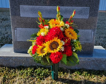Sunflower memorial decoration with faux floral silk geranium grave flowers for cemetery, funeral, or grave decorations.