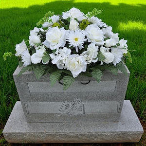 This Jumbo Rose and Mixed flower Headstone saddle has gorgeous white roses, white gerbera daisies, hydrangeas, and more!