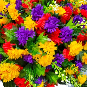 This Headstone Saddle has grave flowers including Multi-Colored Mini Mums. It is a perfect funeral or cemetery decoration. image 9