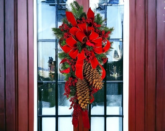 This Christmas Front Door Wreath Swag with Large Pinecones, Berries, Pine, and a Cardinal. Festive Holiday Porch Decorations.
