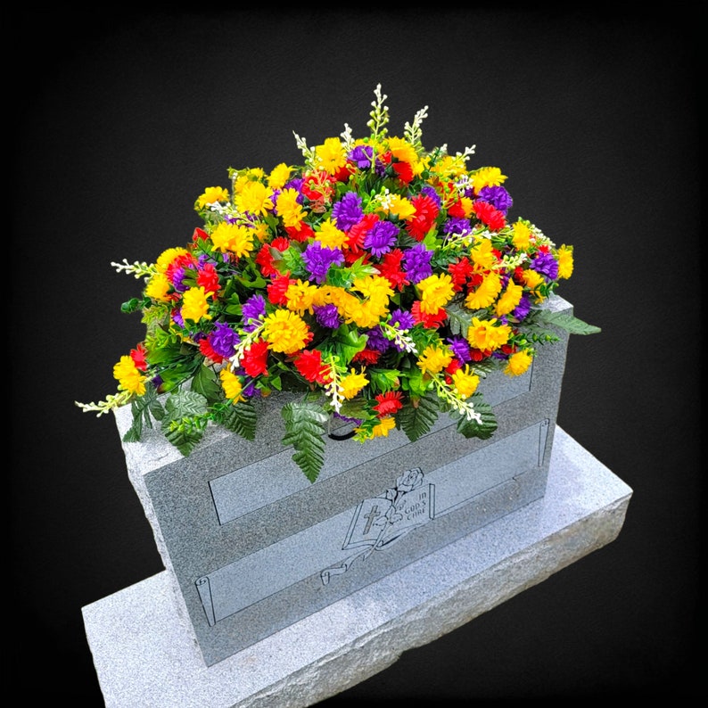 This Headstone Saddle has grave flowers including Multi-Colored Mini Mums. It is a perfect funeral or cemetery decoration. image 2