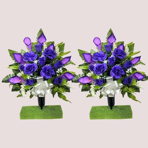 This cemetery cone pair has grave flowers including purple Calla Lily and Roses. It is a perfect funeral or memorial decoration.