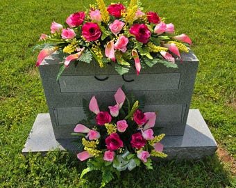 This headstone saddle and single cemetery cone set has silk grave flowers including Beauty Pink Calla Lilies and Roses.