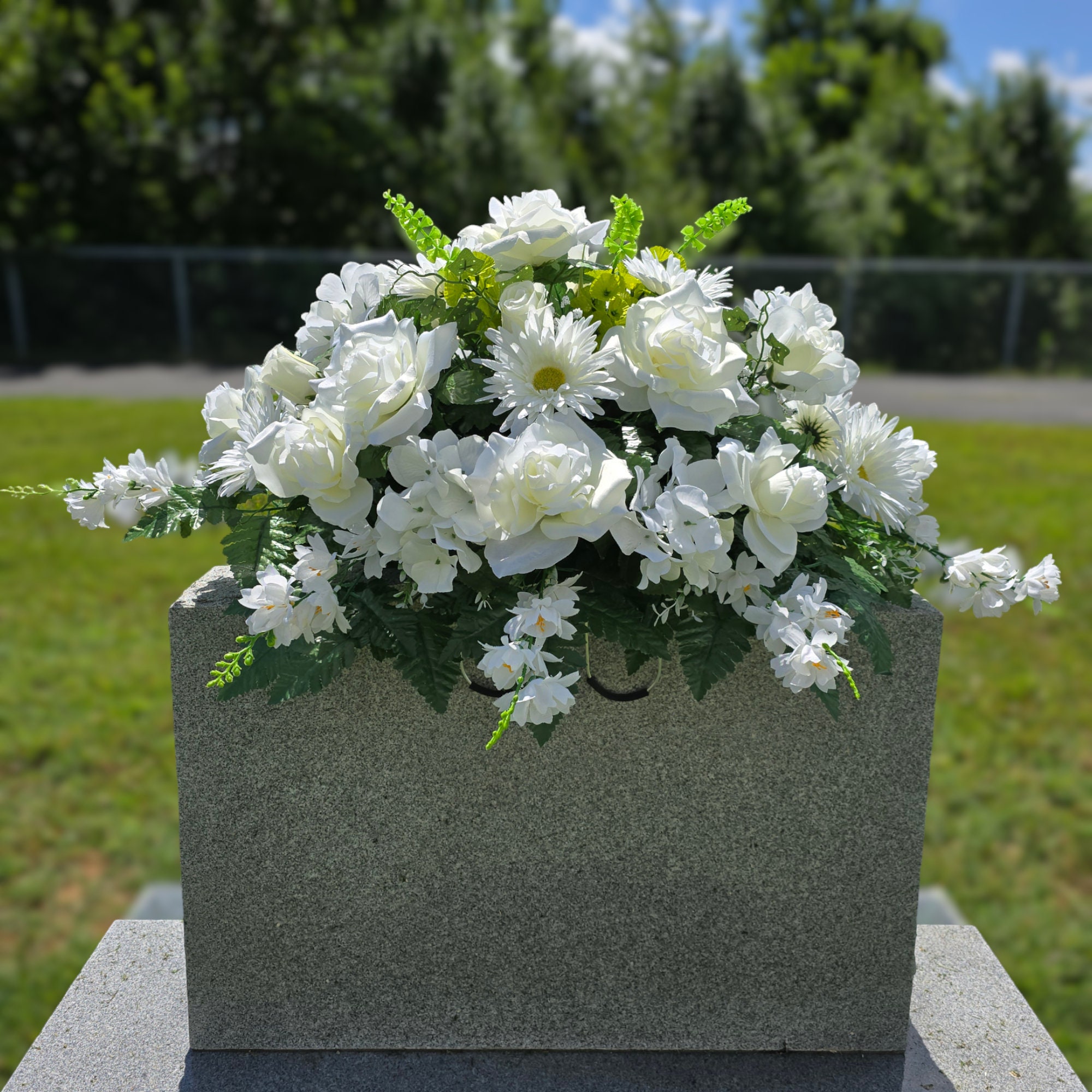 This Jumbo Rose and Mixed Flower Headstone Saddle Has
