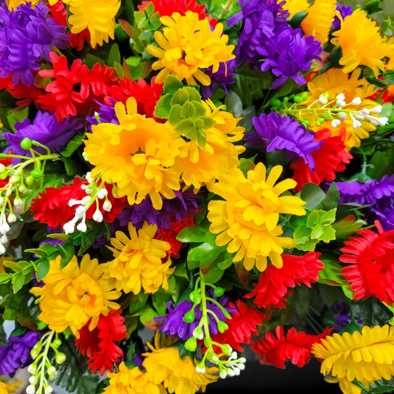 This Headstone Saddle has grave flowers including Multi-Colored Mini Mums. It is a perfect funeral or cemetery decoration. image 8