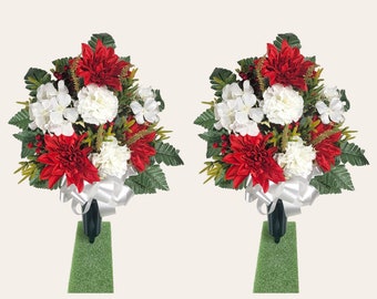This cemetery cone pair has red & white dahlia, hydrangea, and carnation grave flowers with gold glitter accents.