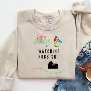 Eating Junk And Watching Rubbish Christmas Sweatshirt Christmas Movie Ugly Christmas Sweater Movie Quote Unisex Crewneck Sweatshirt