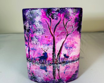 A hand painted and fired ceramic vase by Andrew Jenkins