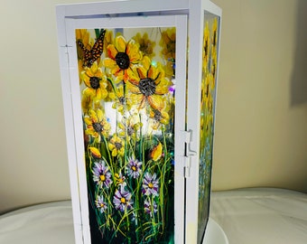 A large hand painted and fired metal and glass lantern by Andrew Jenkins