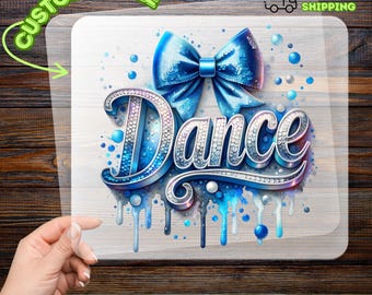 May include: A DTF transfer with a blue bow and the word "Dance" in a jeweled font. The design includes blue watercolor drips and accents. The text "Customizable" and "Ready to Apply" are also present.