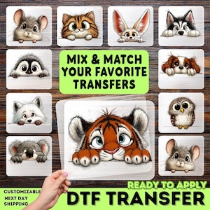 May include: A collection of DTF (Direct to Film) transfers featuring adorable cartoon animals, including a tiger, owl, and mouse. The transfers are ready to apply and customizable. The text "MIX & MATCH YOUR FAVORITE TRANSFERS" is displayed.