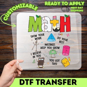 May include: A clear DTF transfer sheet with the word "Math" in green and red, featuring math-related graphics and phrases like "Show Your Work" and "Do Your Best." The sheet is customizable and ready to apply.
