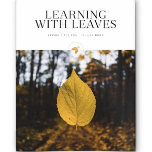 May include: A yellow leaf falls from a tree in a forest. The leaf is in focus, while the background is blurred. The text "LEARNING WITH LEAVES" and "LESSON FIFTY-TWO FALLING DOWN" is at the top of the image.