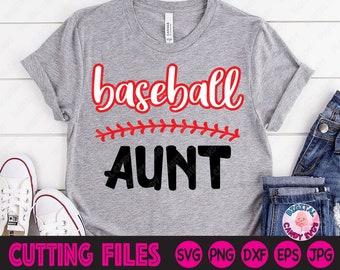 May include: Gray t-shirt with the text "baseball aunt" in red and black lettering. A red and white baseball stitch design is above the word "aunt".