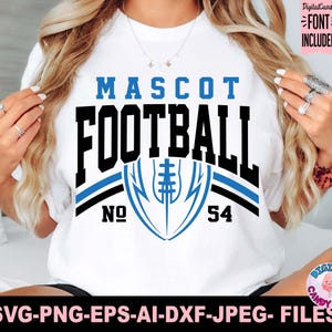May include: White t-shirt with a blue and black football design. The design includes the words "MASCOT FOOTBALL", the number "54", and a football graphic. The text "FONT INCLUDED" is also visible.