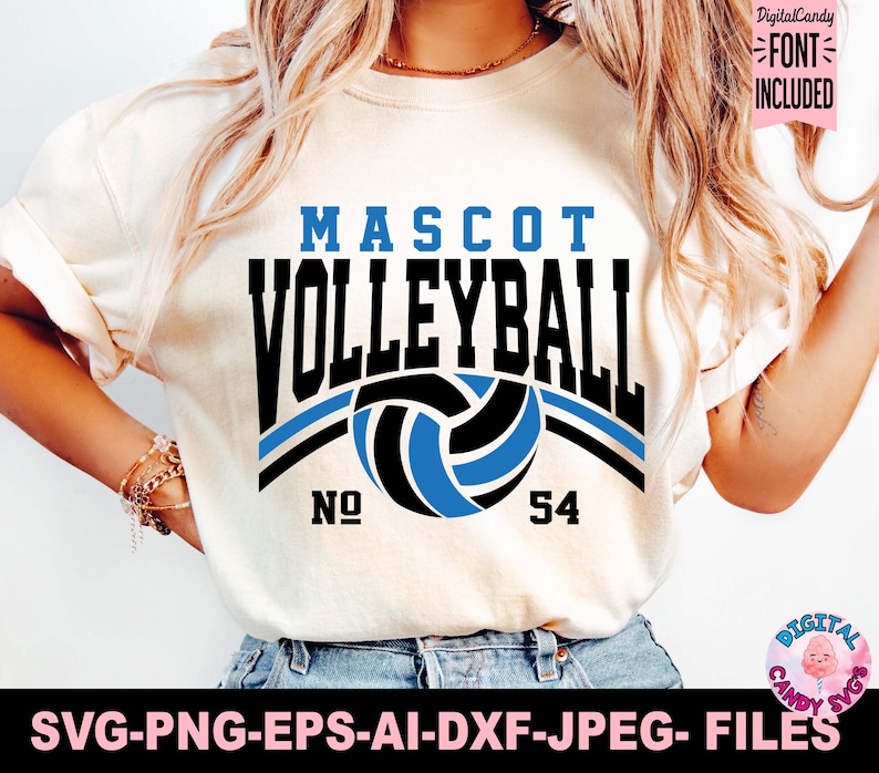 Puede incluir: Camiseta color crema con un dise&ntilde;o gr&aacute;fico llamativo. El dise&ntilde;o presenta la palabra "MASCOT" en azul, "VOLLEYBALL" en negro, un bal&oacute;n de voleibol azul y negro, y el n&uacute;mero "54". La camiseta tambi&eacute;n incluye el texto "SVG-PNG-EPS-AI-DXF-JPEG- FILES".