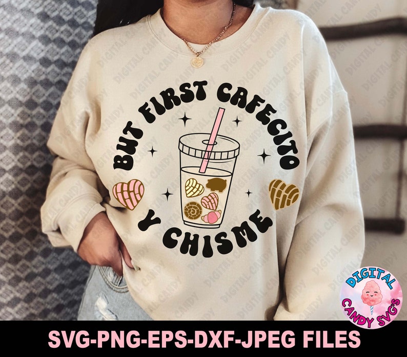 May include: A beige sweatshirt with the text "But first cafecito y chisme" in black. The text is in a circle with a pink and brown illustration of a coffee drink and pastries.