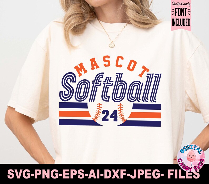 May include: A white t-shirt with a blue and orange softball design. The text "MASCOT Softball 24" is printed on the shirt.