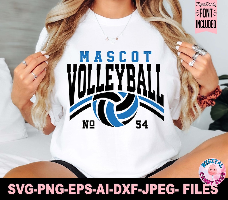 Puede incluir: Camiseta blanca con un dise&ntilde;o de voleibol azul y negro. El dise&ntilde;o incluye las palabras "MASCOT VOLLEYBALL" y el n&uacute;mero "54". La camiseta tambi&eacute;n tiene el texto "SVG-PNG-EPS-AI-DXF-JPEG- FILES".