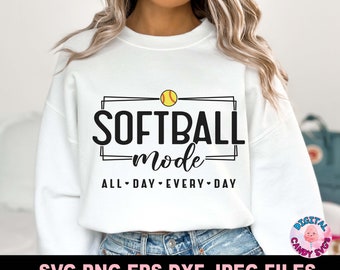 May include: White sweatshirt with a black and white graphic design that says "Softball mode" with a yellow softball graphic. The text below the graphic says "All Day Every Day".