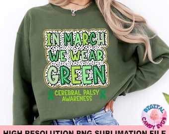May include: Green sweatshirt with the text "In March We Wear Green" and "Cerebral Palsy Awareness" in a green and white polka dot design.