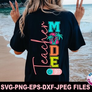 May include: Black t-shirt with a colorful graphic design that says "Teacher Mode" with palm trees and a power button that says "Off".
