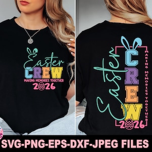 May include: Black t-shirt with the text "Easter CREW" in pastel colors, including blue, green, orange, and purple. The shirt also features the text "Making Memories Together" and the year "2026". The design includes bunny ears and an Easter egg.