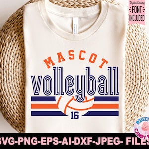 May include: A white t-shirt with a blue and orange volleyball design. The text "MASCOT volleyball" is in a blue and white striped font. The number 16 is in the center of the design.
