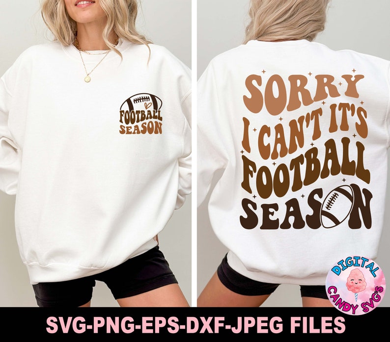 May include: White sweatshirt with a brown football graphic and the text "Football Season" on the front. The back of the sweatshirt has the text "Sorry I Can't It's Football Season" in brown with a brown football graphic.