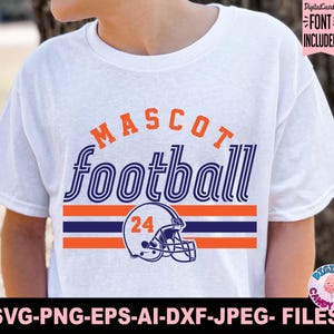 May include: White t-shirt with a football-themed design. The design includes the word "MASCOT" in orange, "football" in blue, and a football helmet with the number 24. The shirt also includes the text "SVG-PNG-EPS-AI-DXF-JPEG- FILES".