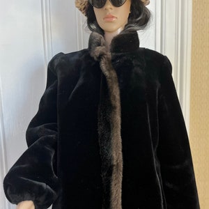 Black swirl faux fur coat store
