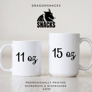 May include: Two white ceramic mugs with black text. The smaller mug says "11 oz" and the larger mug says "15 oz". The mugs are professionally printed and microwave and dishwasher safe.